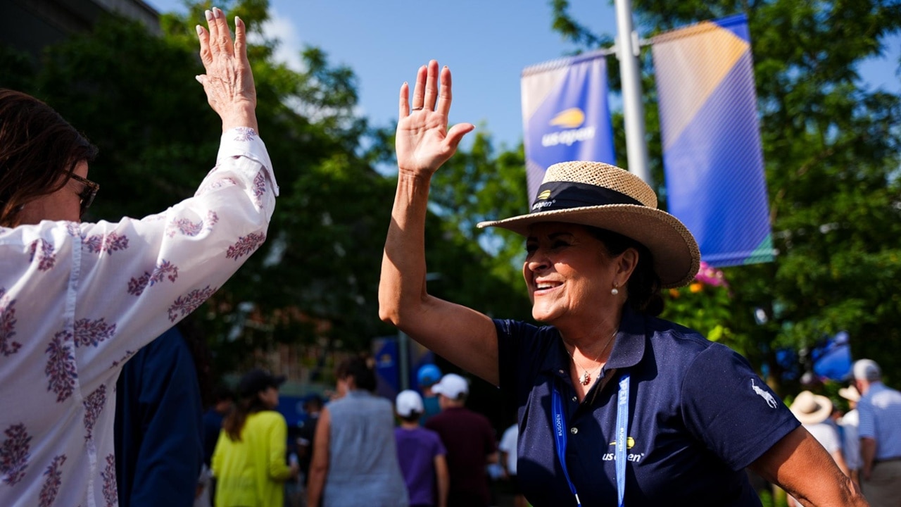 Guest services team welcomes arriving fans at the main entry