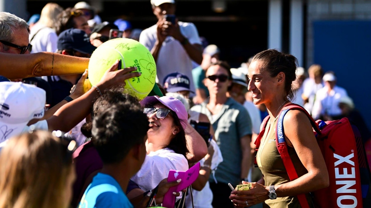 Caroline Garcia signs autographs in her final US Open appearance