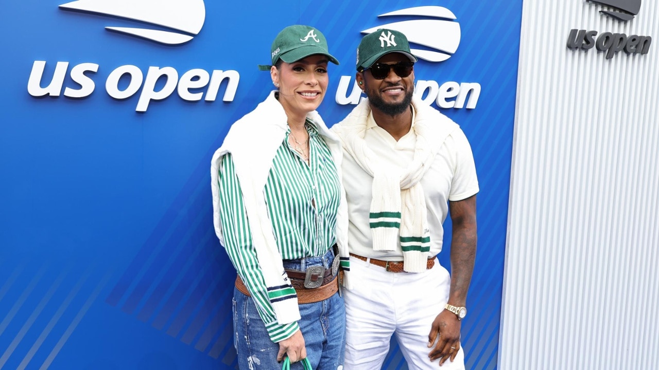 Usher and guest on the Blue Carpet at the 2025 US Open.